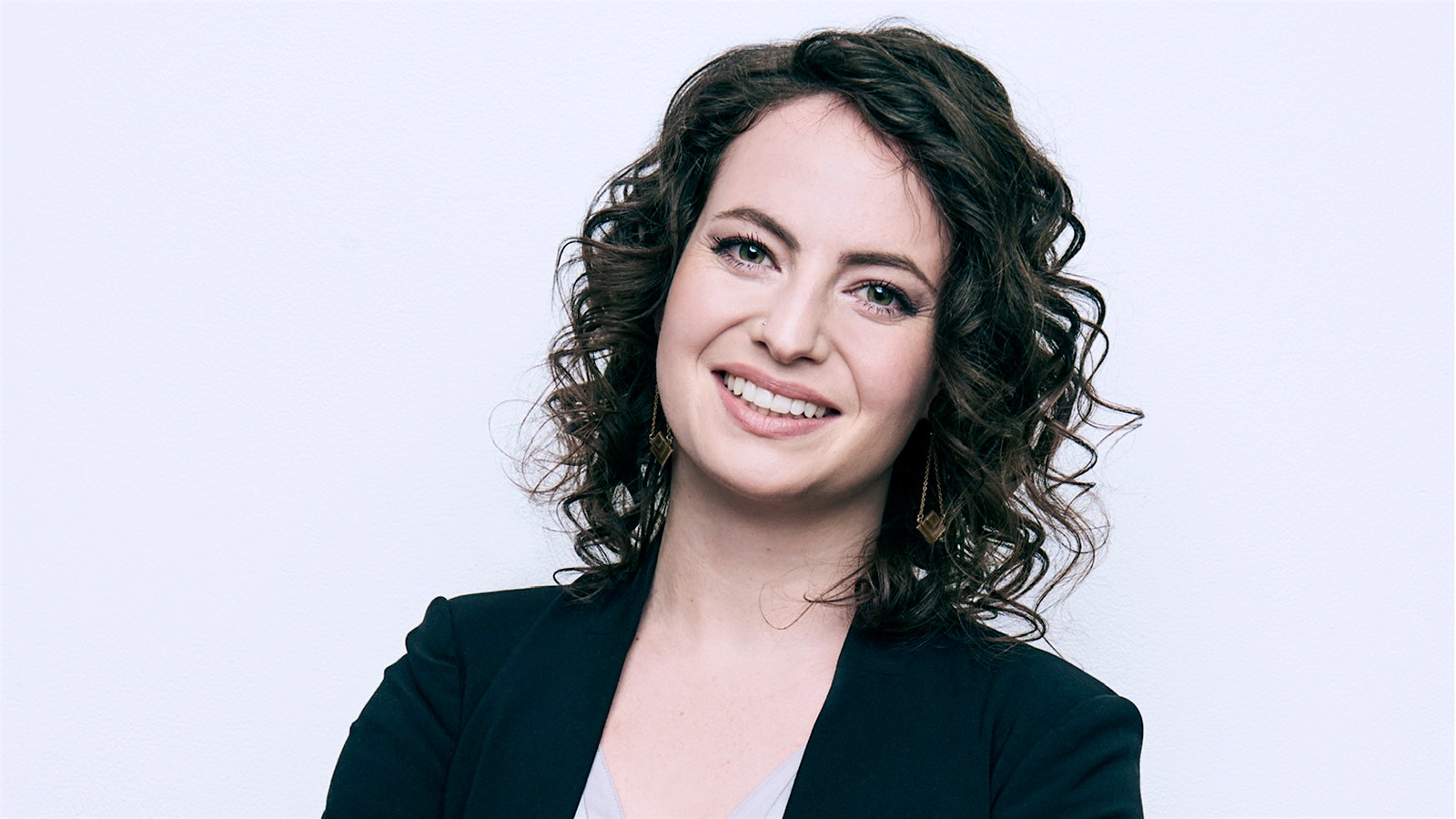 A portrait of Andrea Morris on a white background.